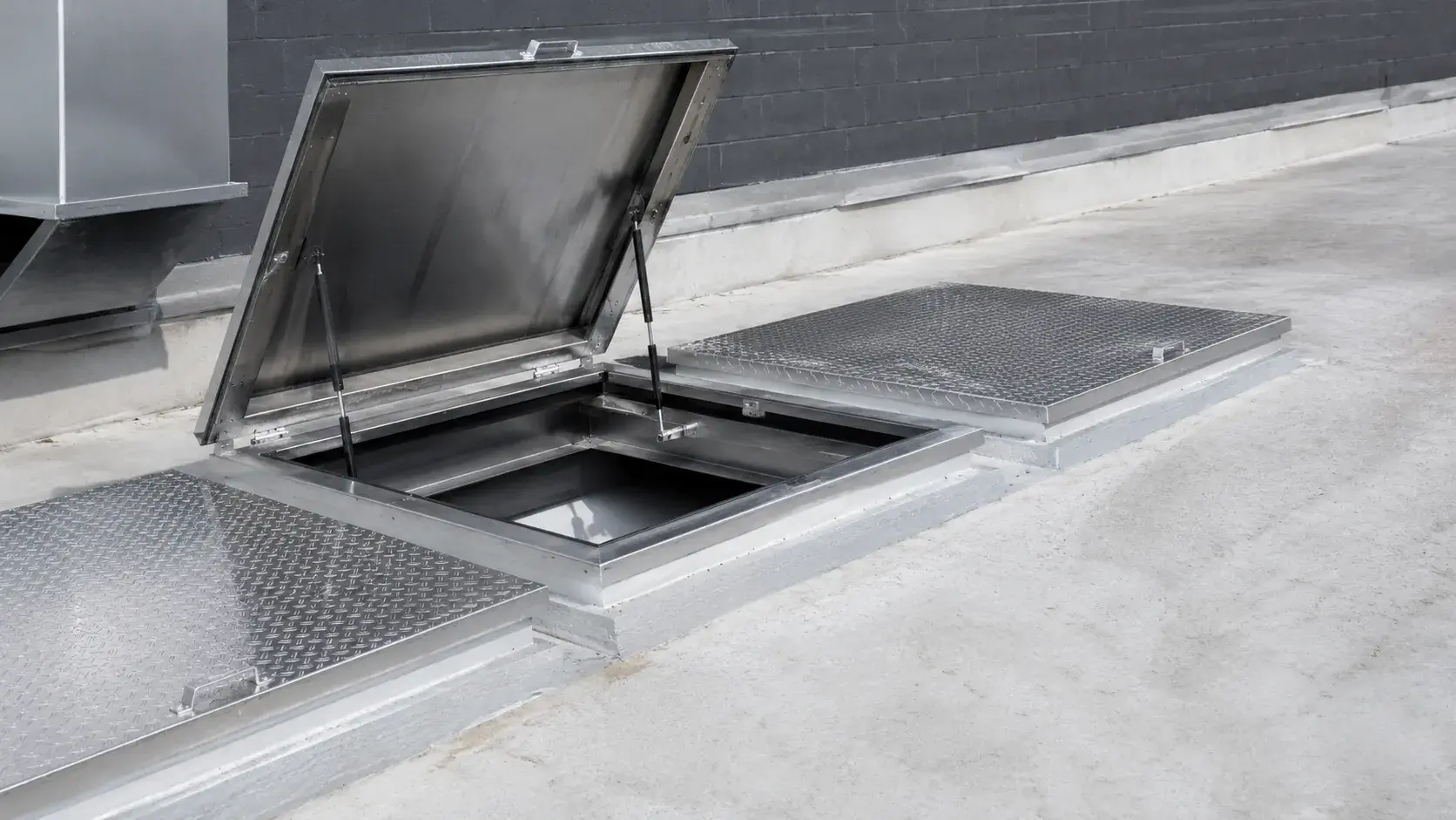 Access Hatch Covers in North York, Ontario, fabricated and installed by The Grate Guys