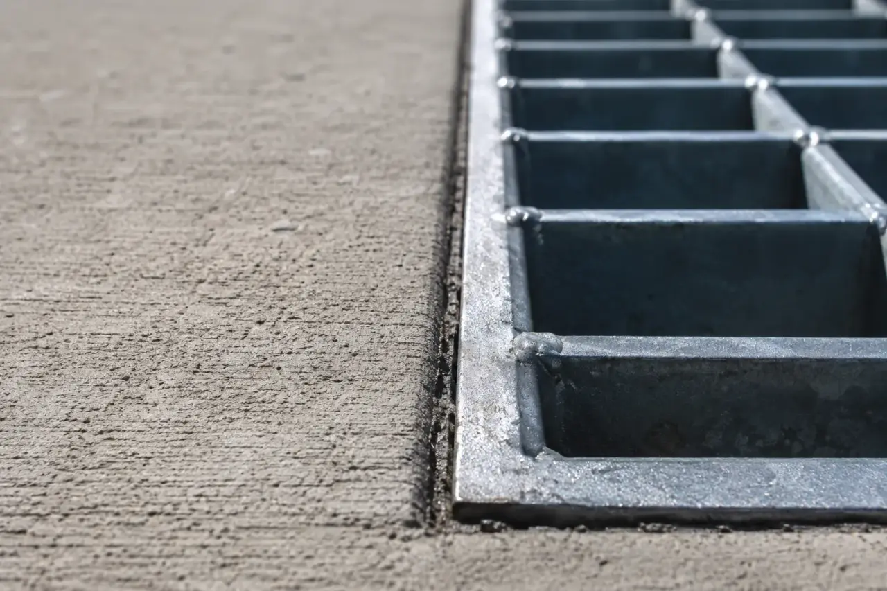 Asphalt Repair Around Drains and Grates in Markham being fabricated and installed by The Grate Guys