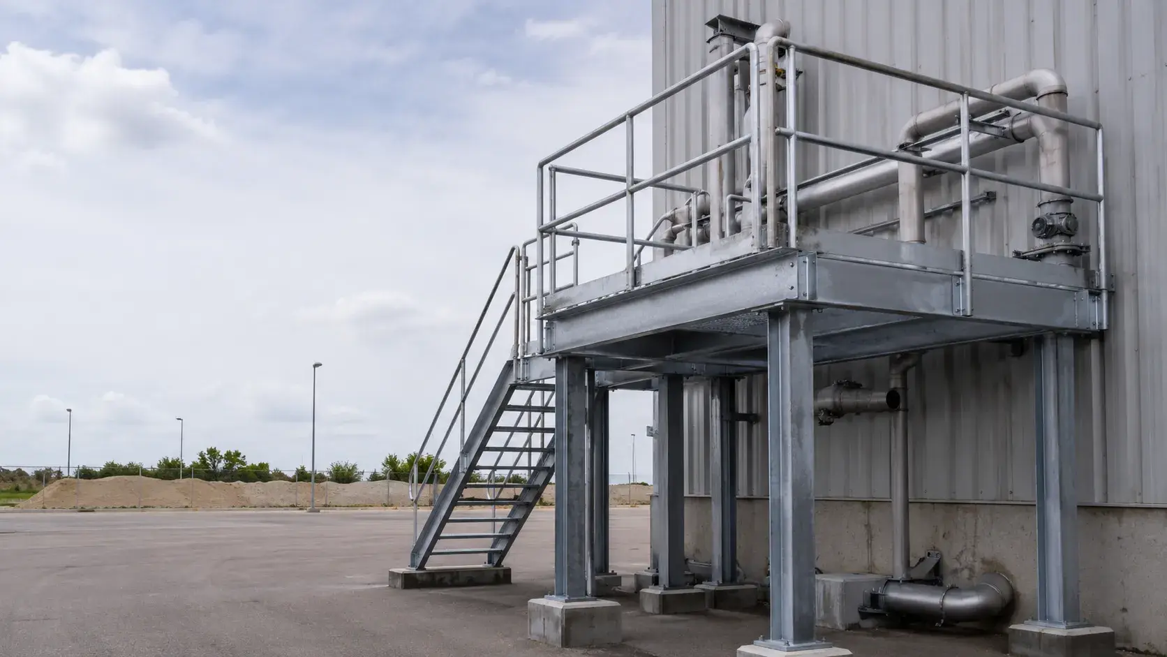 Load-rated industrial access platform fabricated for a facility in Ontario