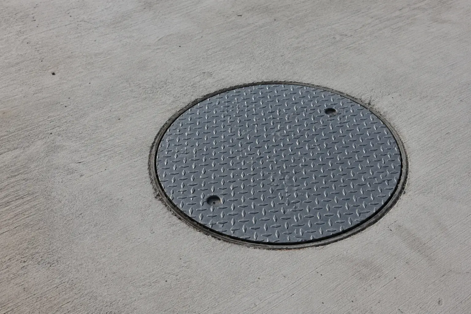 Manhole Covers in Pickering, Ontario, fabricated and installed by The Grate Guys